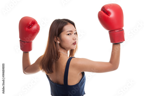 Young Asian woman with red boxing gloves.