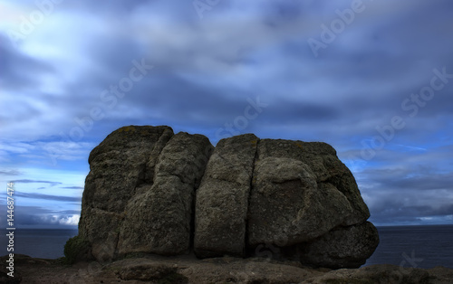 Landscape of towering granite cliffs and rock at Lands End Cornwall England UK Europe