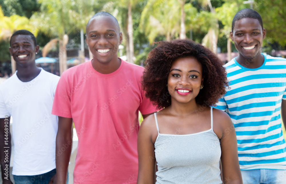 Group of four happy african american woman and man