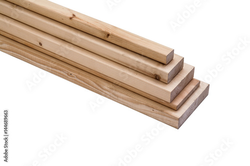 Pine wooden board on white background. Construction boards.
