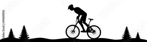 Silhouette Mountainbiker Wald