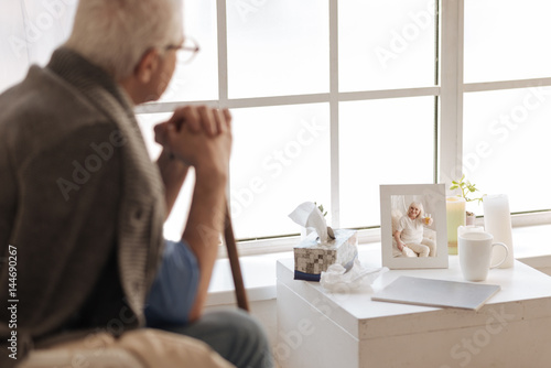 Fotografija Photo of a joyful elderly woman