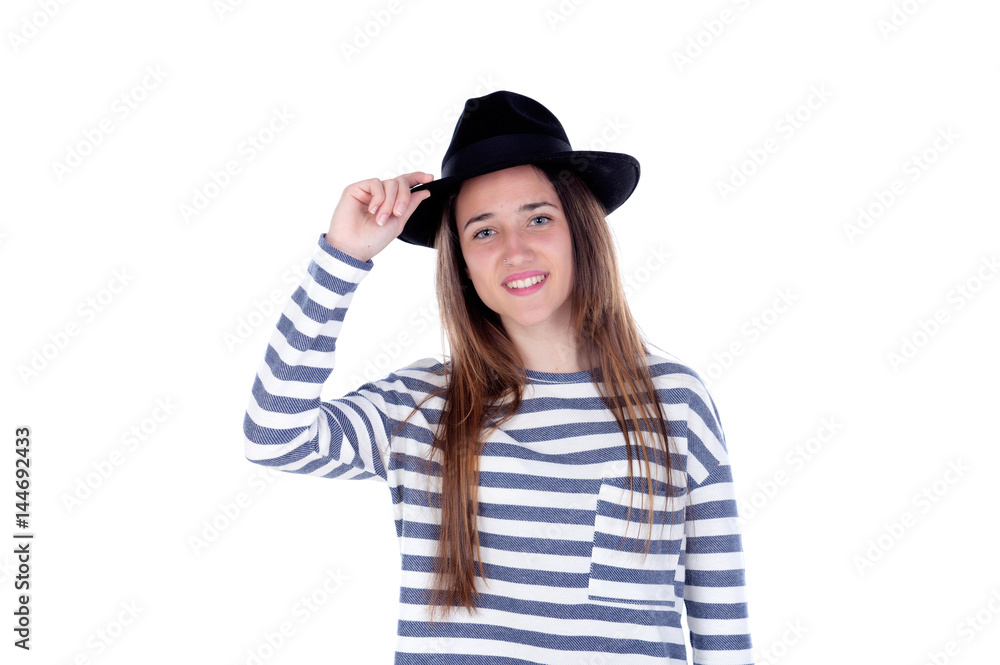Pretty teenager girl with black hat posing at studio. Pretty teenager girl with black hat posing at studio.