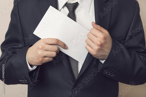 Businessman taking a bribe