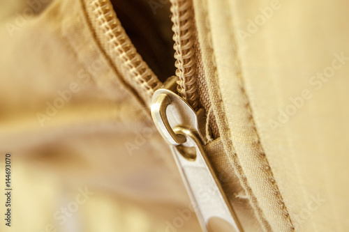 Close-up of a metal zipper photo