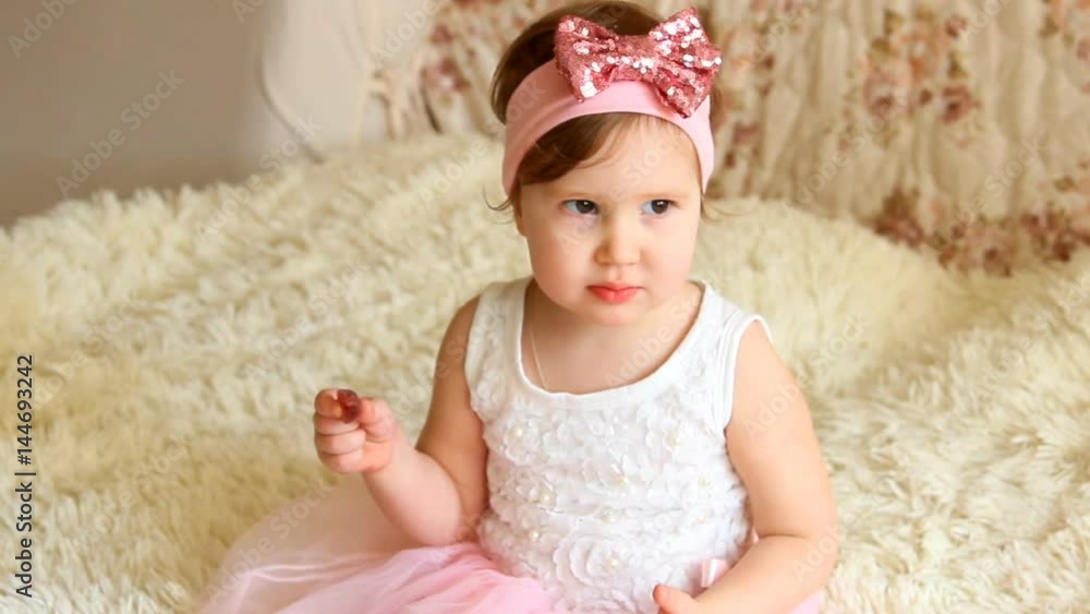 Beautiful funny happy child is playing Waving handles Beautiful funny happy child is playing Waving handles