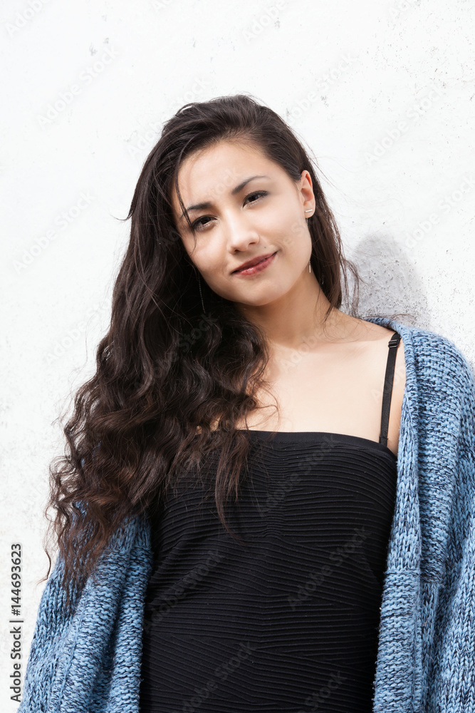 asian woman outdoor smiling to camera