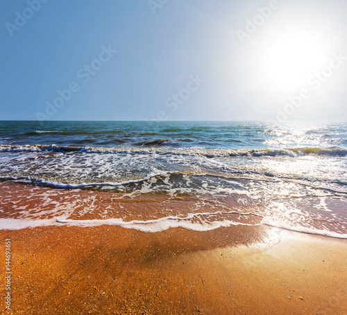 sea beach under a sparkle summer sun