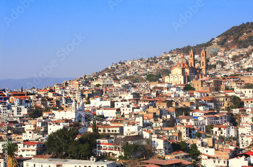 View on Taxco de Alarcon city and Santa Prisca Parish Church, Mexico