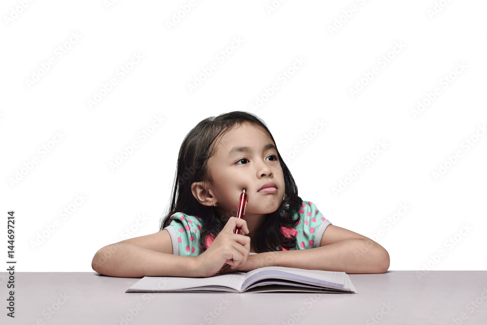 Cute asian girl studying with book and pencil Cute asian girl studying with book and pencil
