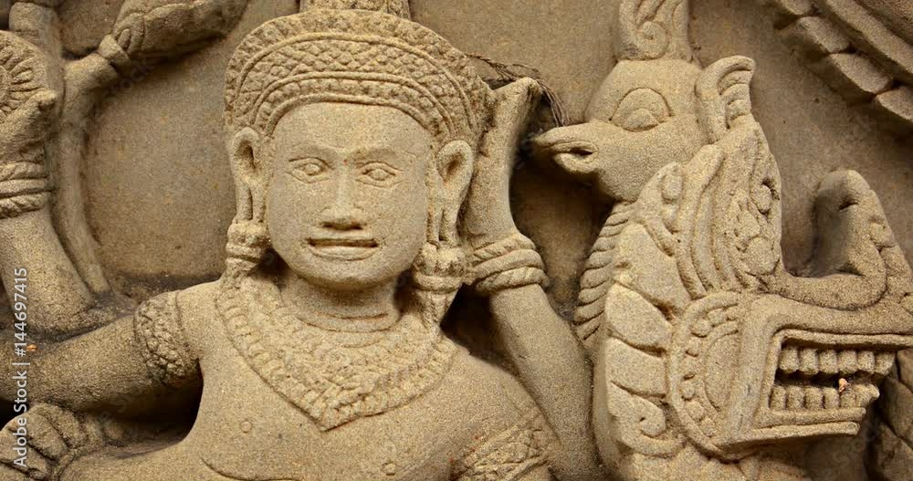 Ancient Relief Sculpture on Temple Wall in Ayutthaya, Thailand Ancient Relief Sculpture on Temple Wall in Ayutthaya, Thailand