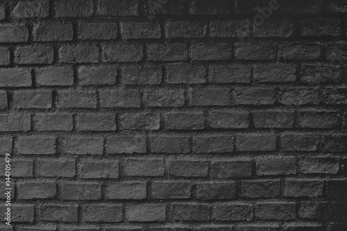 horizontal part of black painted brick wall.