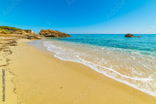 Golden shore in Santa Giusta beach