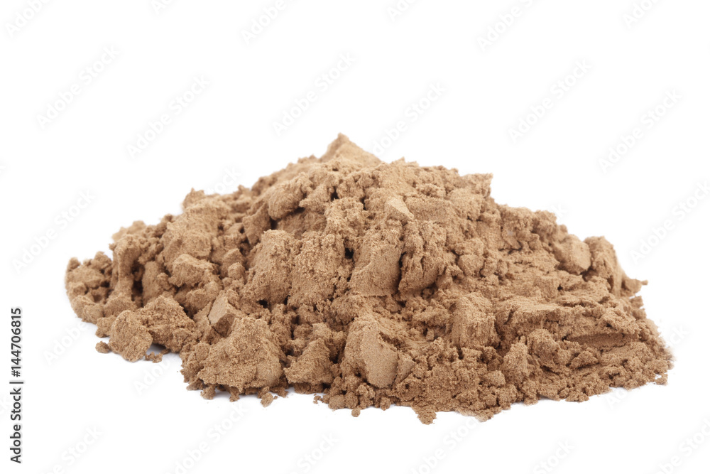 heap of ground cacao isolated