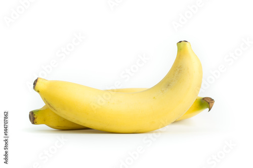 Golden banana on a white background