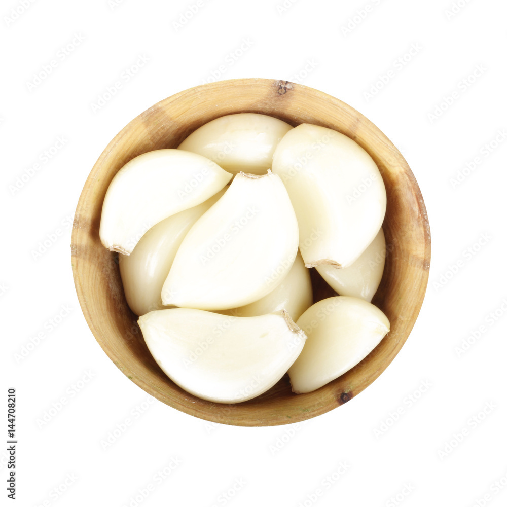 garlic in wooden cup isolated garlic in wooden cup isolated