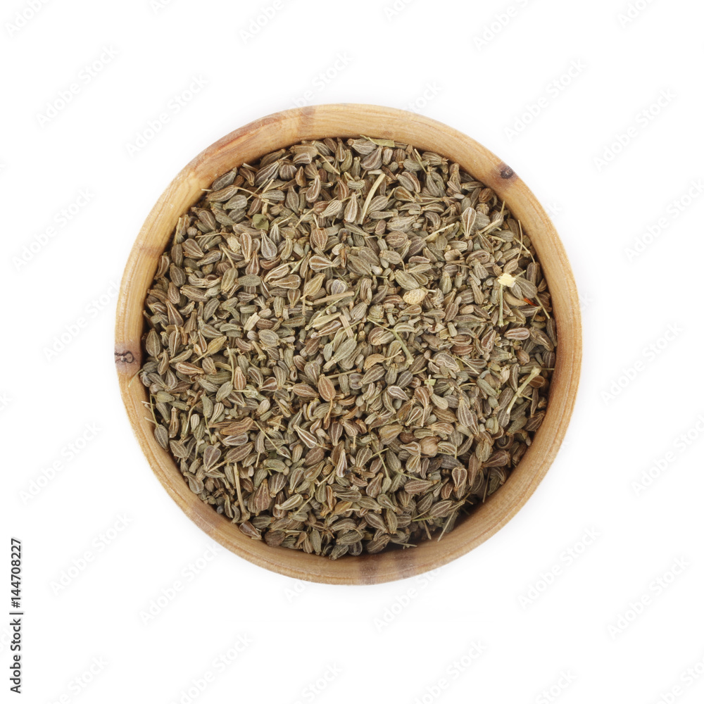 anise in wooden cup isolated anise in wooden cup isolated