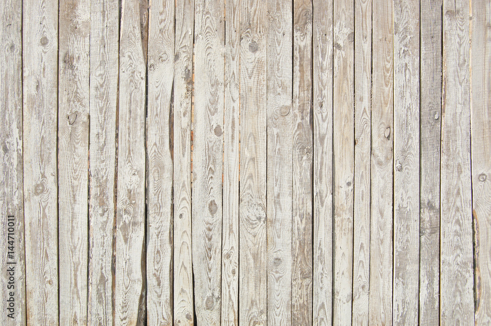 white old wooden fence. wood palisade background. planks texture white old wooden fence. wood palisade background. planks texture