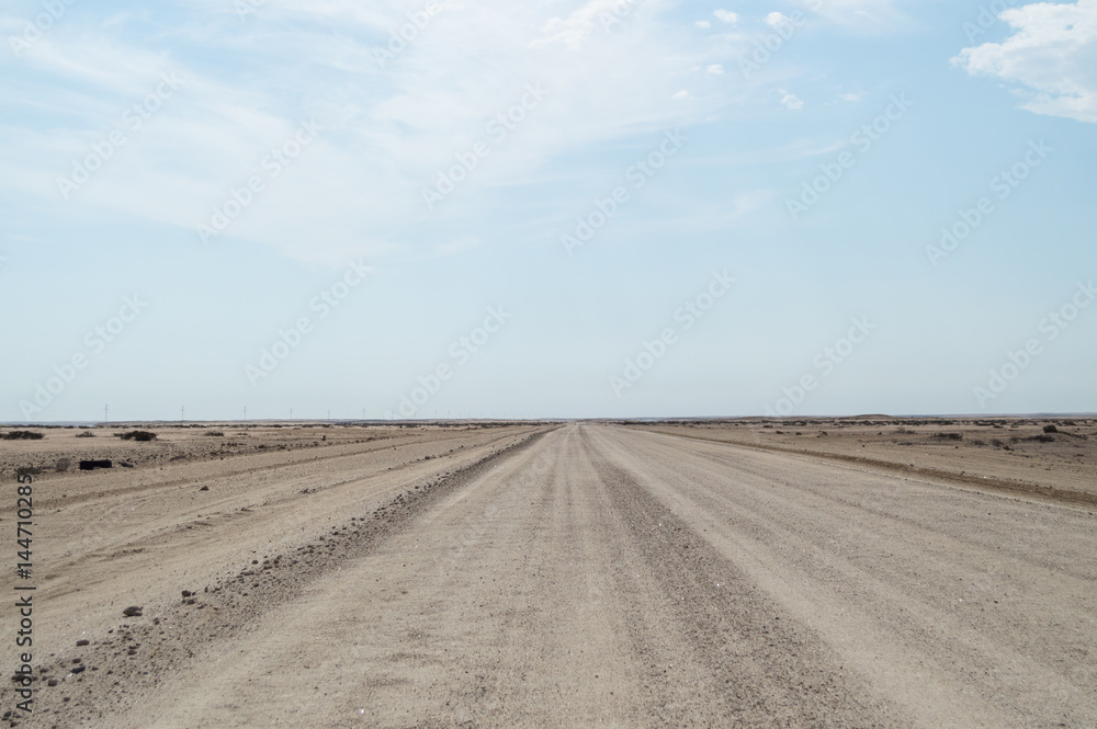 Endless Dirt Road in the Desert between Walvis Bay and Solitaire in Namibia