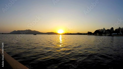 Timelapse. View of the Pichola lake in Udaipur city  in Rajasthan state, India. photo