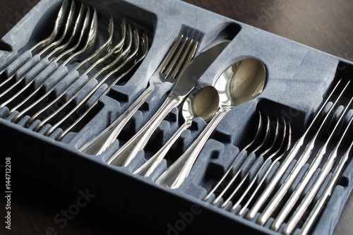 Photography Blue flatware box isolated on black background