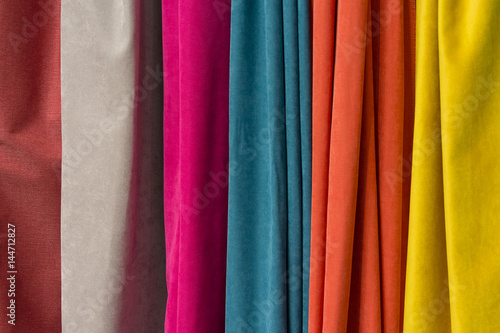 Jaws of colorful fabric in the store