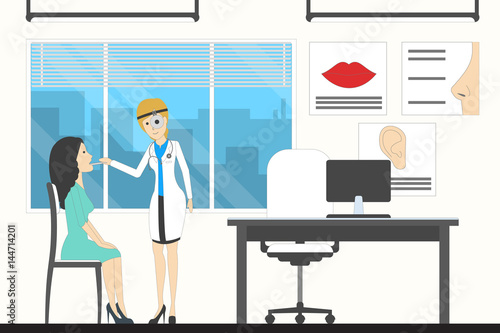 Otolaryngologist in hospital. Female patient with doctor in the cabinet.