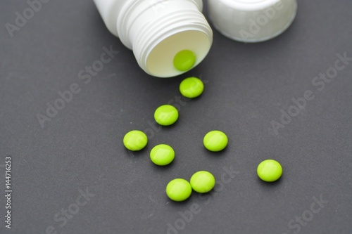 Pills on a black background photo