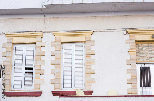 Window with white shutters
