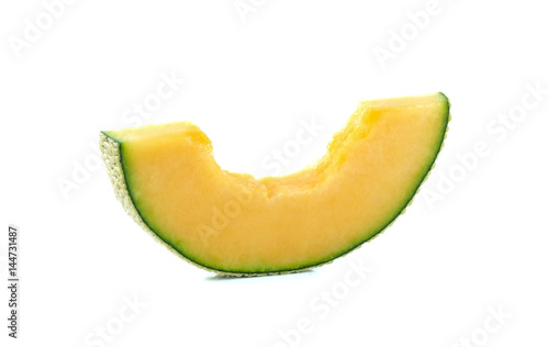Melon slice on white background.