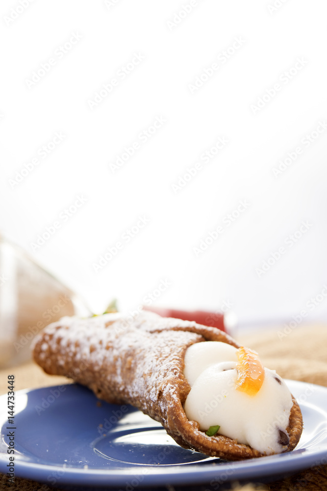 sicilian cannolo with filling of ricotta cream sicilian cannolo with filling of ricotta cream