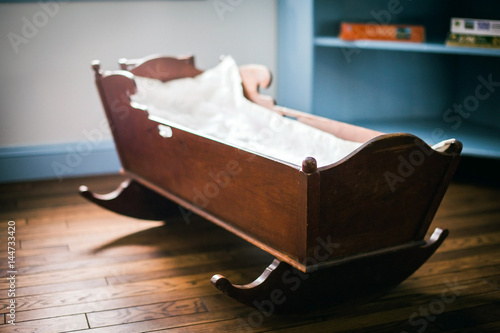wooden vintage cradle photo