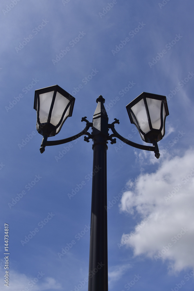 Street lamp on blue sky background
