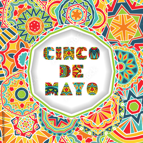 Cinco De Mayo card with greetings lettering and ornate background.