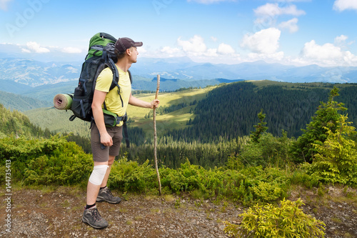hiker with backpack photo