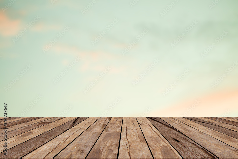 blurred natural sparkle sunny sky backdrop wall with old brown wood floorboard background texture tabletop:rustic aged tiles wooden with blur wallpaper.advertise,show promote products on display image