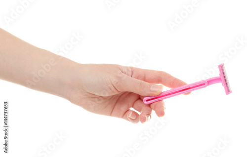 Female hand with safety razor on white background