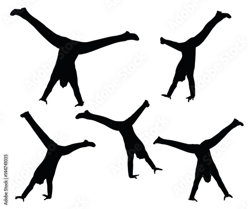 boy silhouette in sitting Cartwheel pose