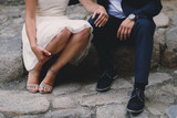 Bride and groom's legs and shoes