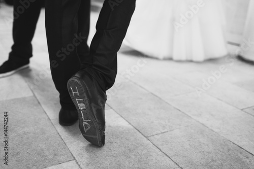 Groom's legs and shoes
