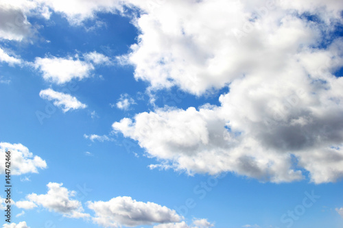 Fototapeta Naklejka Na Ścianę i Meble -  White and gray clouds float on the blue sky