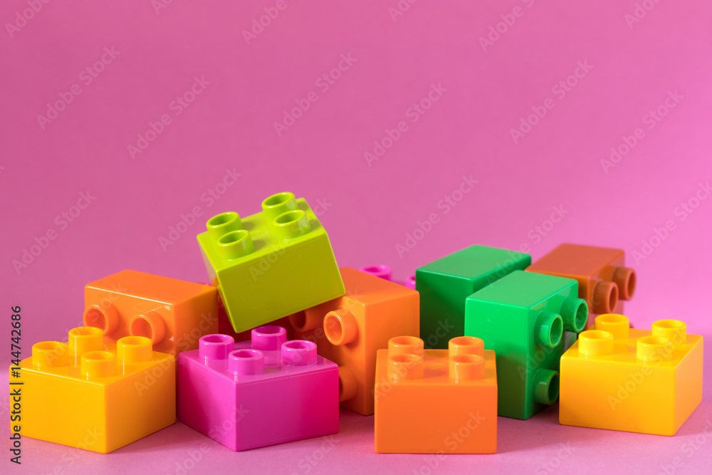 Naklejka premium block on pink background.