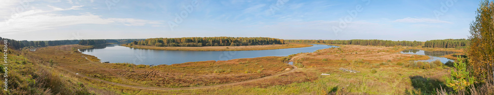Panorama of Vetluga River valley from high bank with dirt road and wood on opposite riverside. Nizhegorodsky region, Russia.
Panorama of Vetluga River valley from high bank with dirt road and wood on opposite riverside. Nizhegorodsky region, Russia.