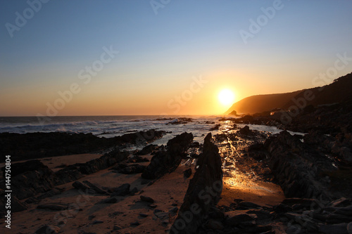 Beautiful sunset over the rocky coastline of the Tsitsikamma National Park - South Africa