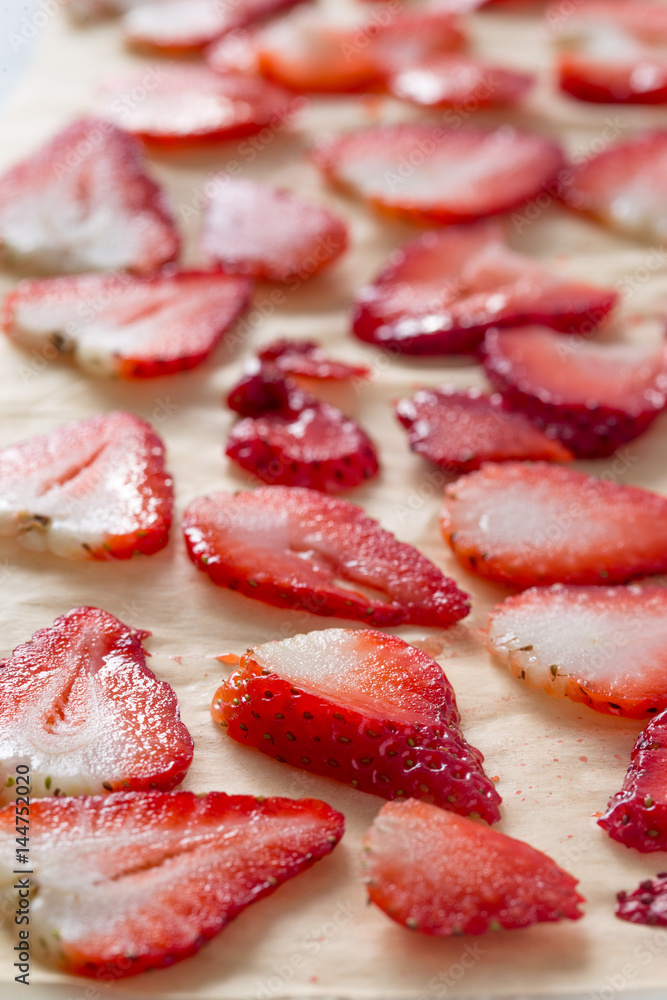 Red sliced Juicy and fresh strawberries. Summer food background for your design. Red sliced Juicy and fresh strawberries. Summer food background for your design.