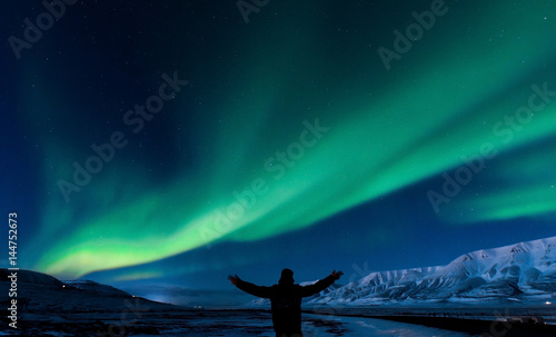 The polar Northern lights in the mountains of Svalbard, Longyearbyen, Spitsbergen, Norway wallpaper