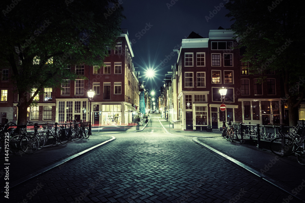 Naklejka premium Amsterdam nocą, Holandia