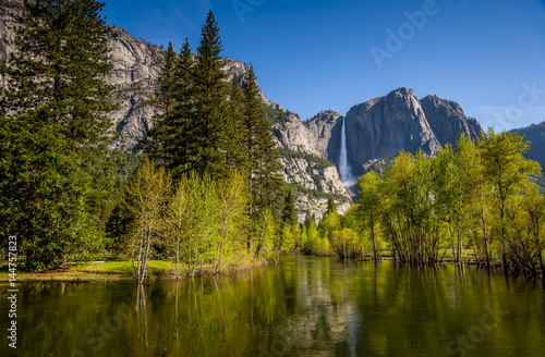 Mountains with waterfall and lake