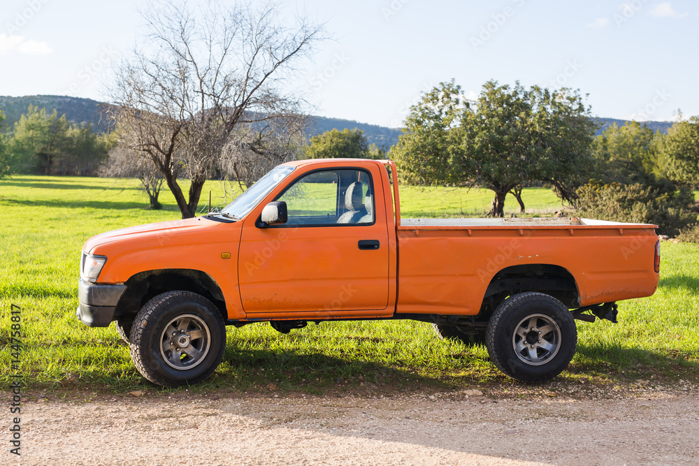 Pickup truck at sunny day in nature Pickup truck at sunny day in nature