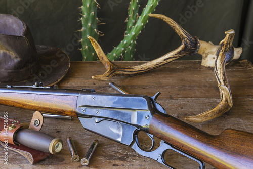 western still life/american carbine, antlers, hunting knife